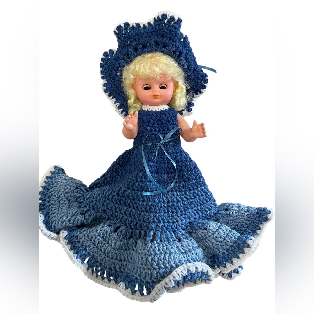 Doll with handmade blue crochet‎ dress and hat